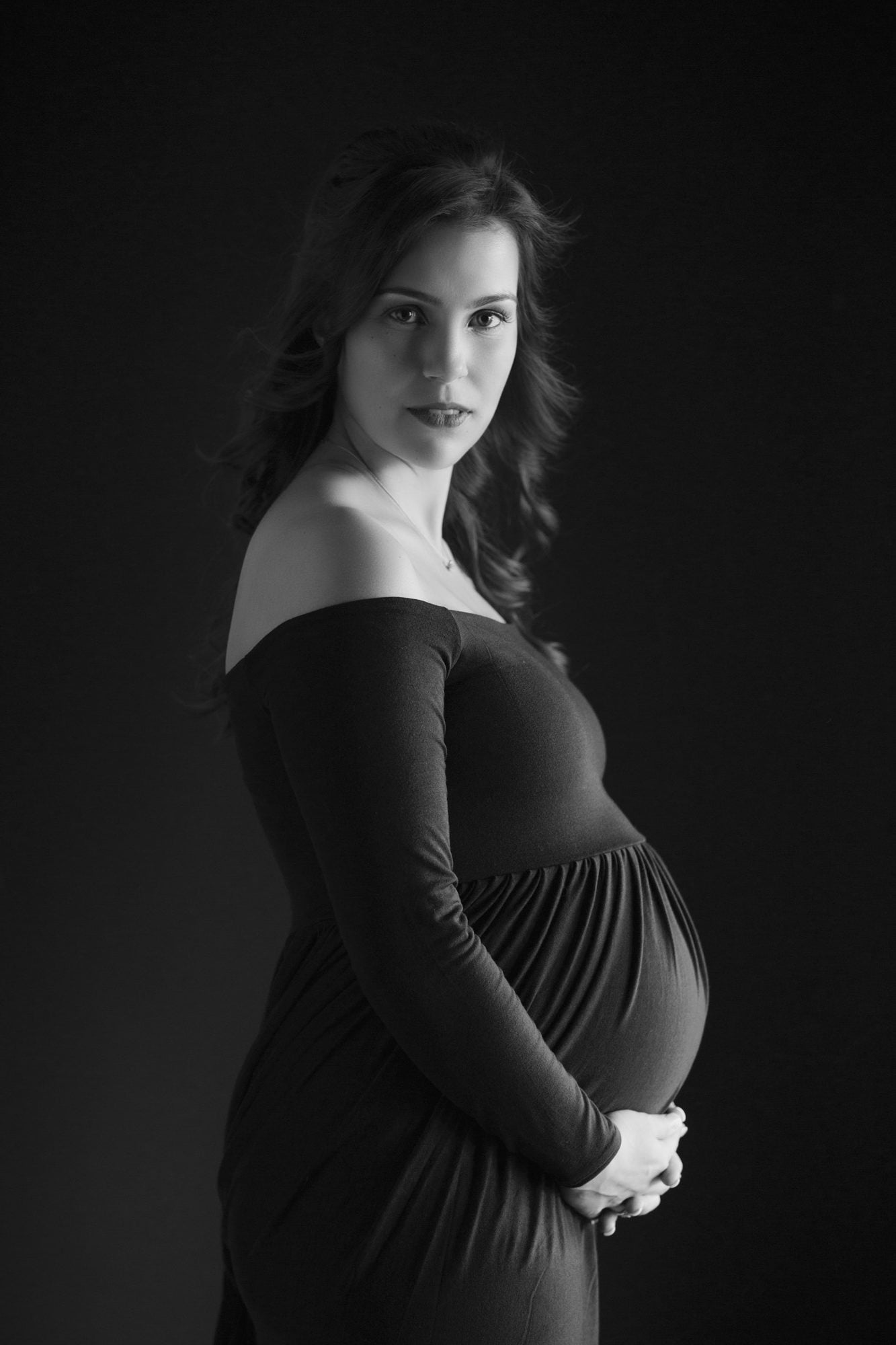 black and white portrait of a pregnant mother
