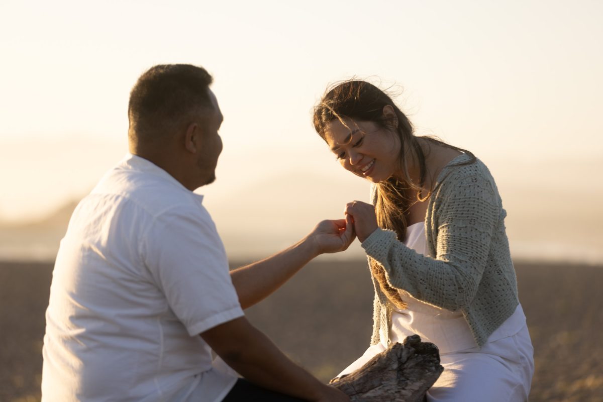Woman Admires Engagement Ring